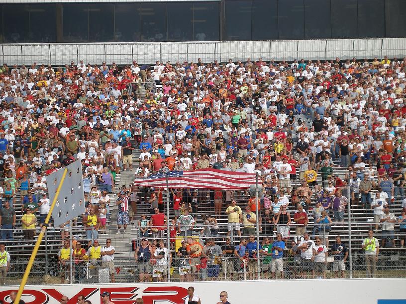 the Boy Scouts of America presented the colors on the track.