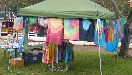 A booth of colorfully dyed clothing