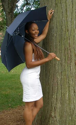 Miss Hadassah with prop by really big tree